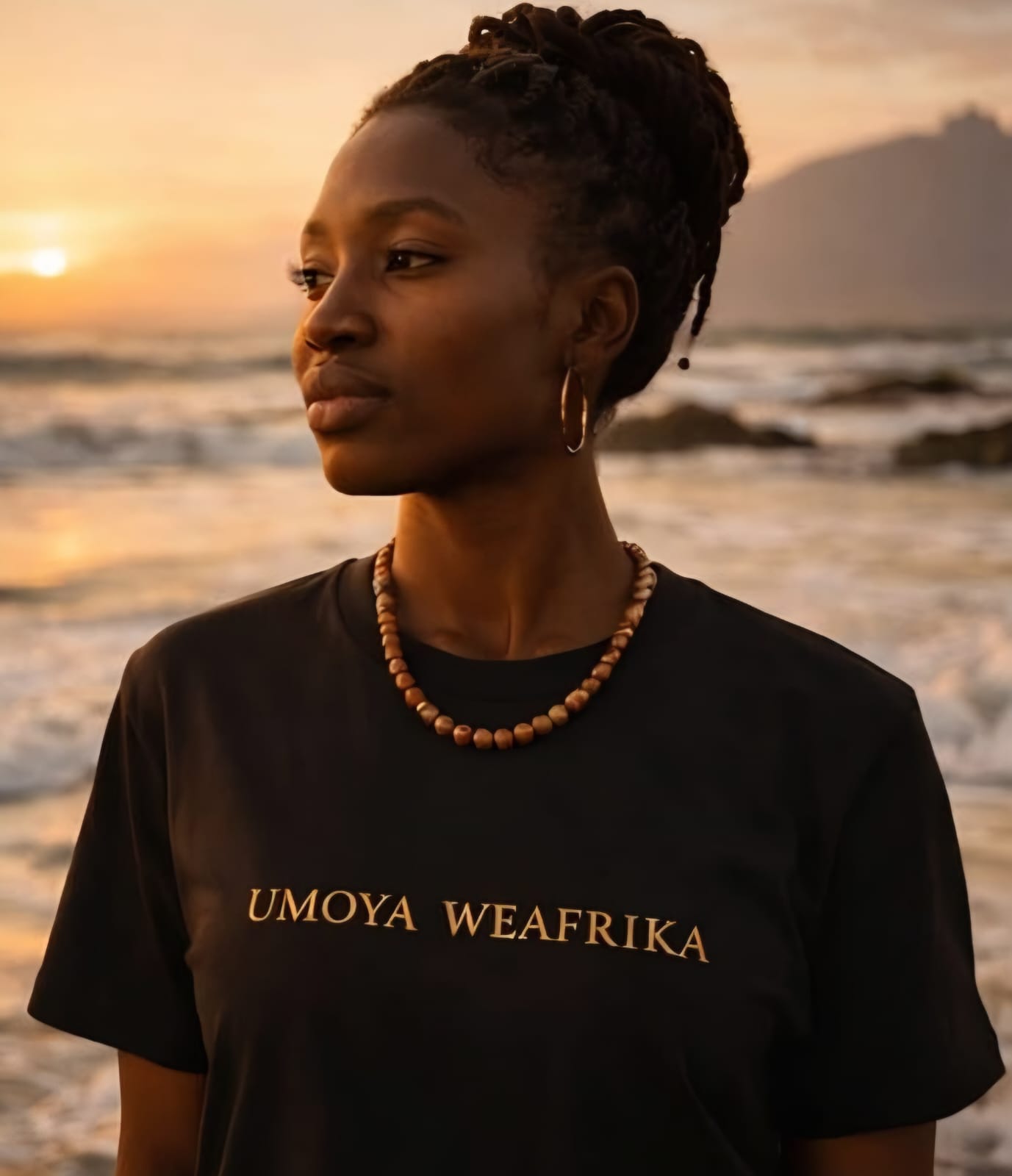 Model wearing the white Umoya WeAfrika T-shirt